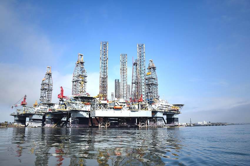 a large industrial shipping and cargo platform out at sea